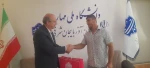 تقدیر رئیس دانشگاه ملی مهارت واحد استانی آذربایجان شرقی از قهرمانی جهانی دانشجوی کشتی گیر                                                                                                                               2